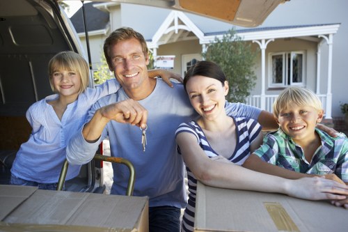 Careful loading of furniture and boxes into a moving van
