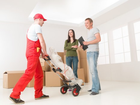 Packing and loading belongings into a van for a local South Wimbledon move