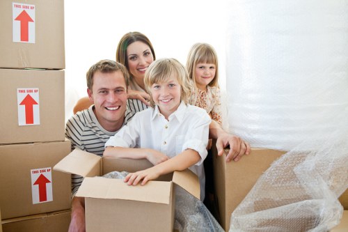 Unpacking boxes in a South Wimbledon flat or house
