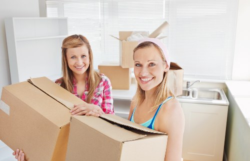 Local movers preparing items in a South Wimbledon property