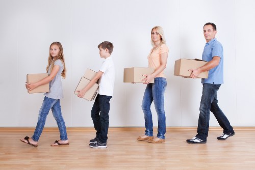 Careful packing and furniture moving during a local removal job